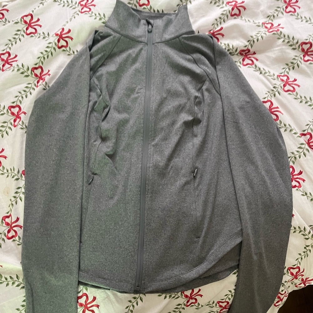 A gray workout jacket